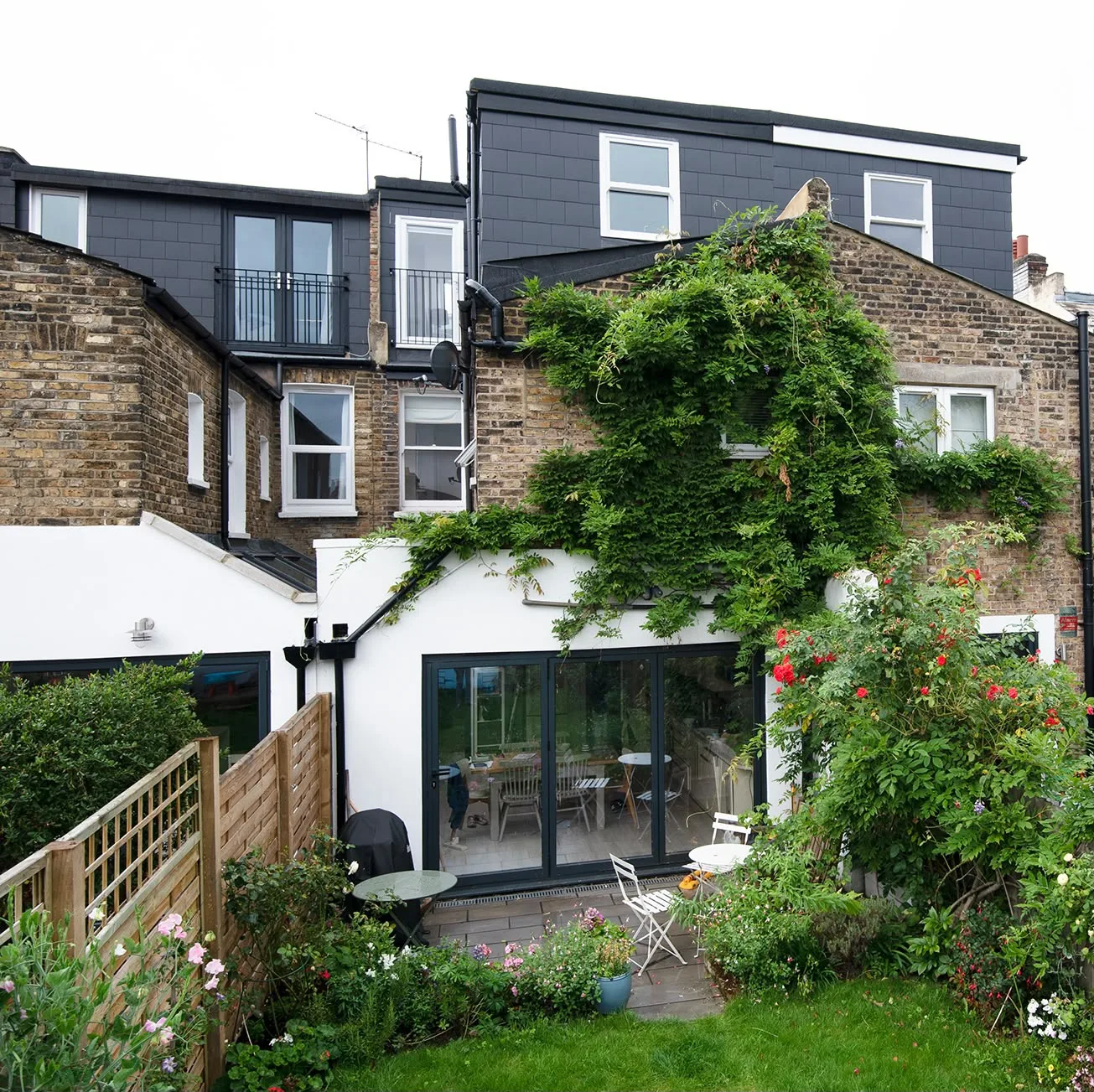 Modern brick home extension with garden